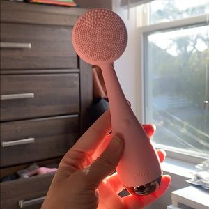 PMD facial cleanser device